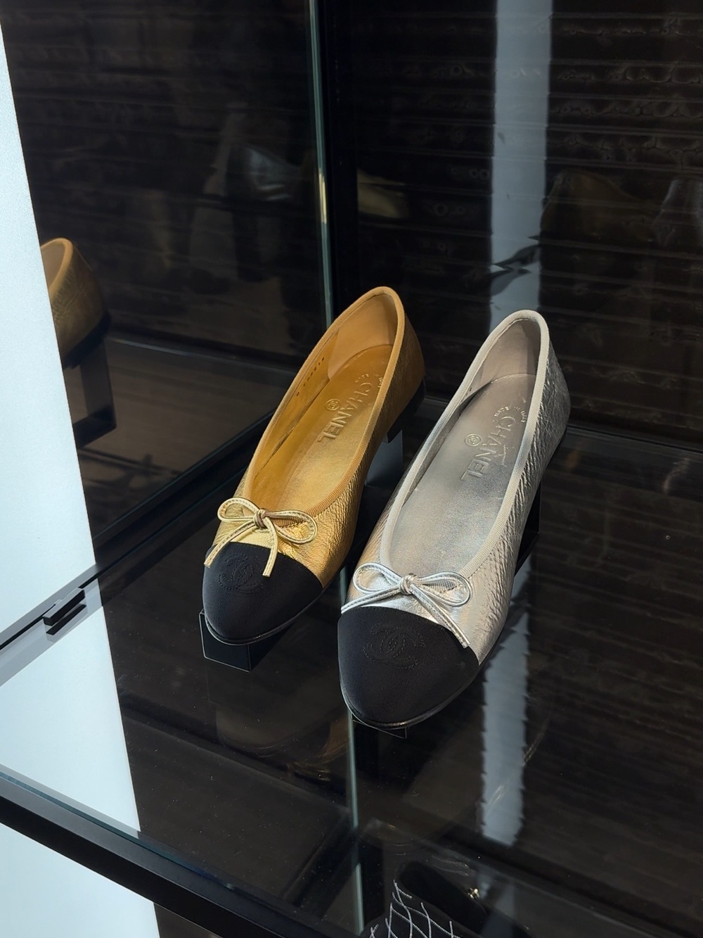 CHANEL Gold Ballet Flats with Black Toe | Size 38.5